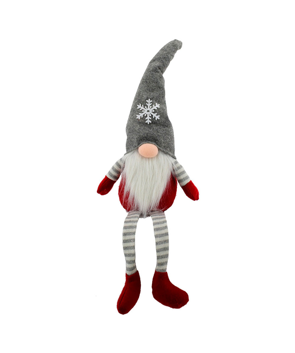 Gnomo sentado con gorro copo de nieve